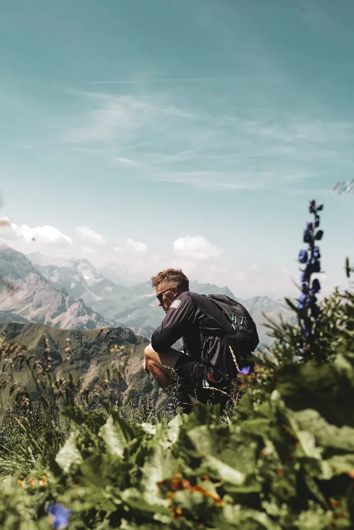 a man climbing a mountain